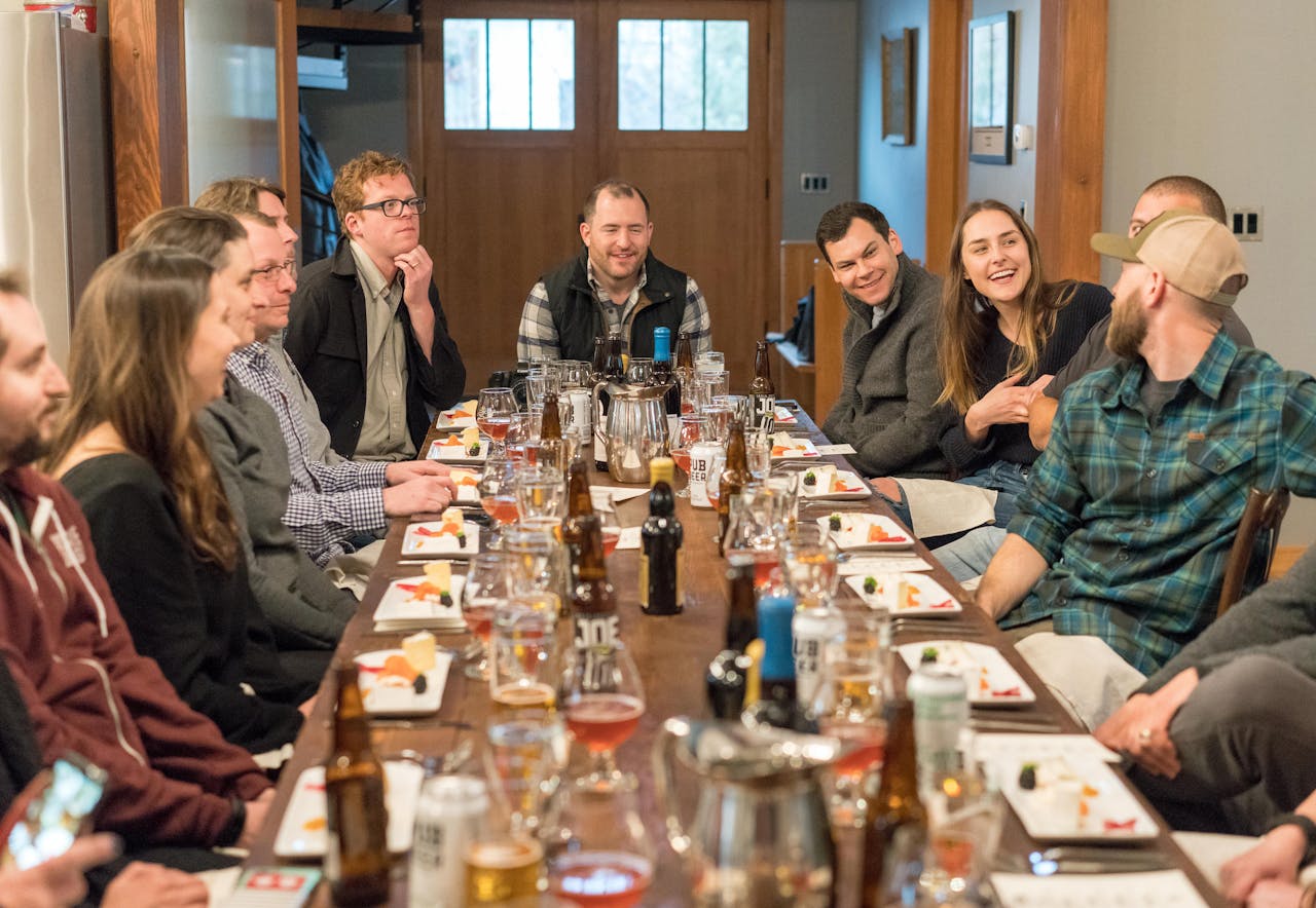 Group of happy diners enjoying a meal together at a restaurant